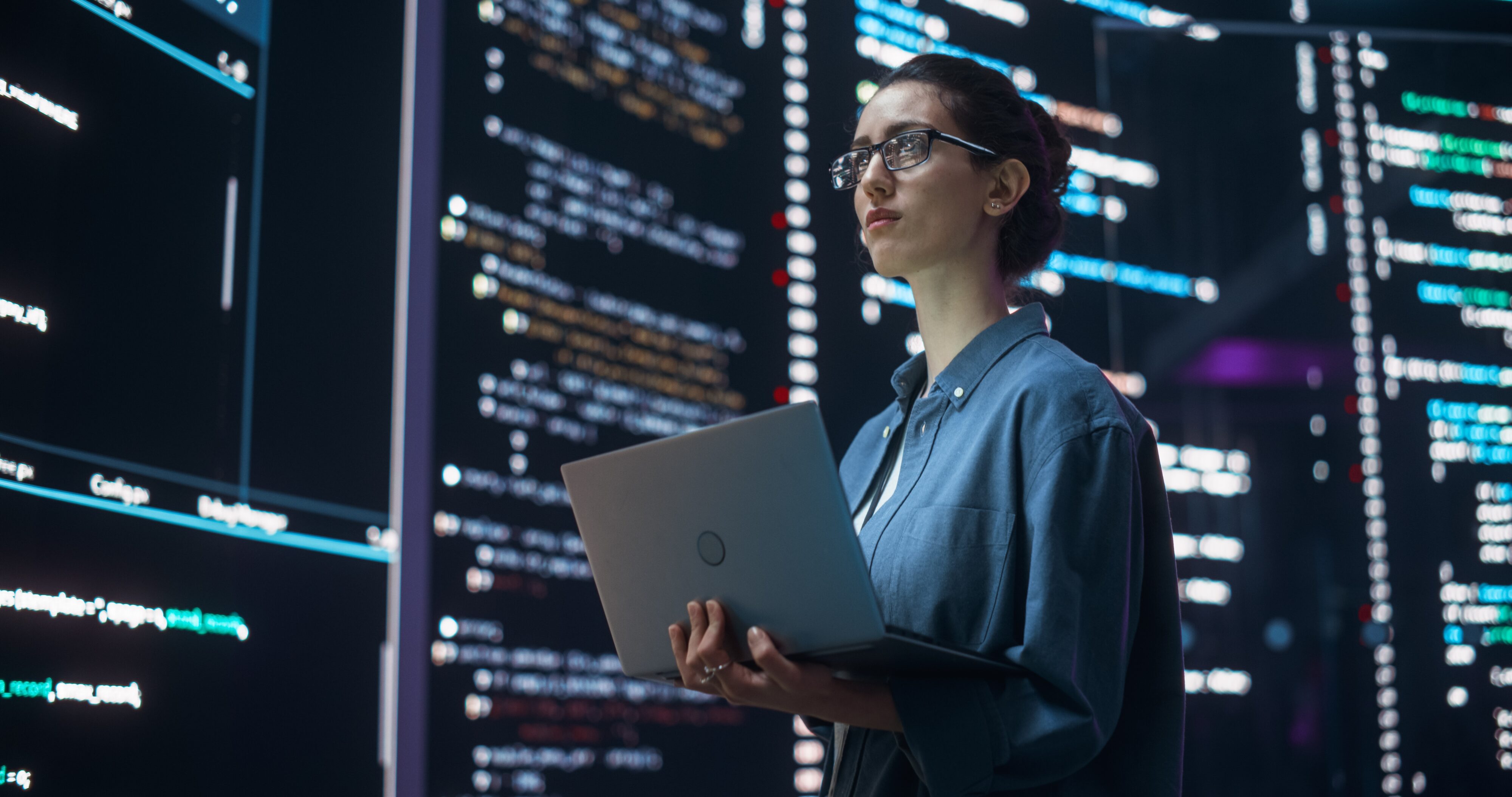 Portrait,Of,Woman,Creating,A,Software,And,Coding,,Surrounded,By